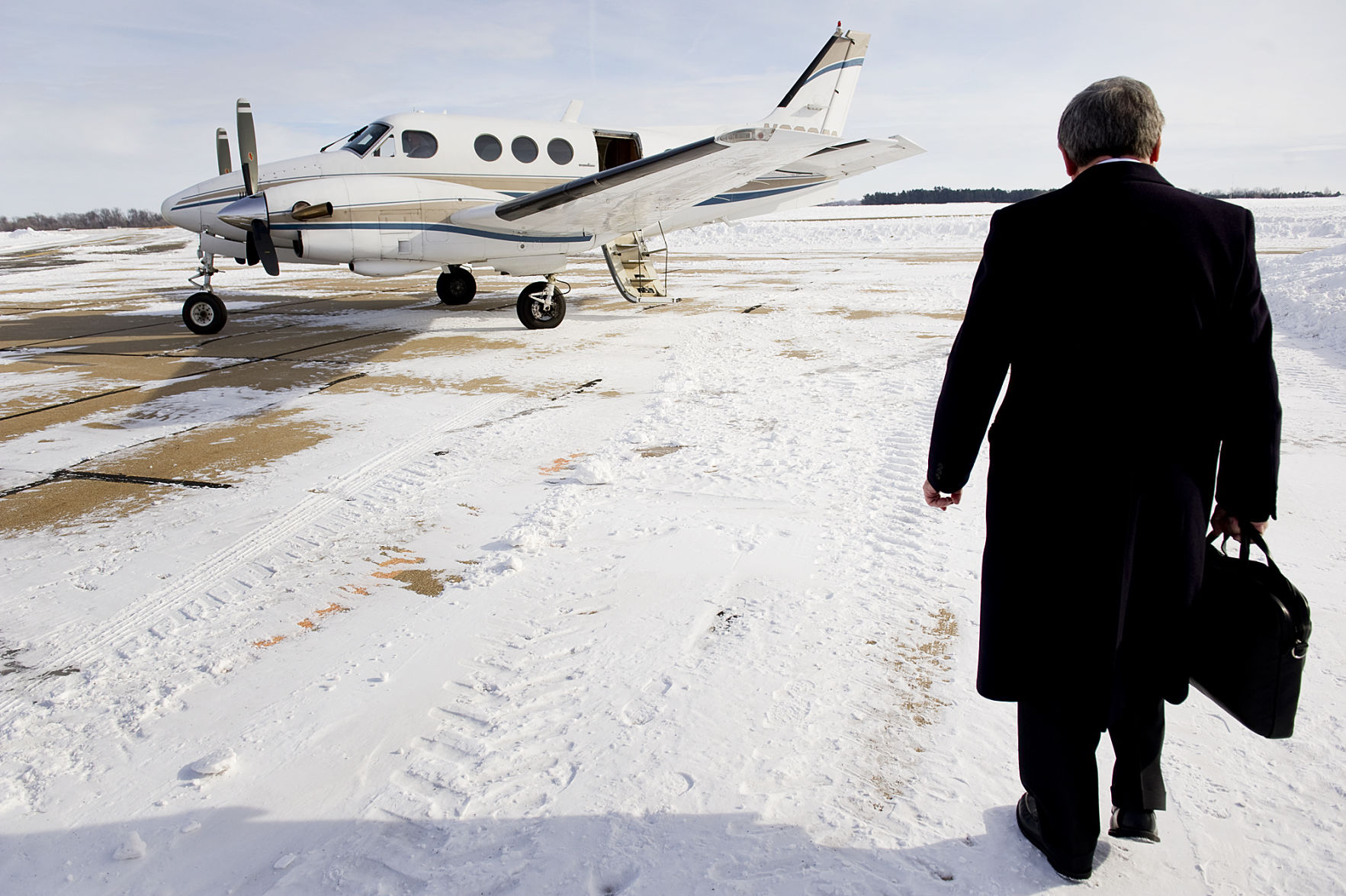 Ben Nelson boarding airplane